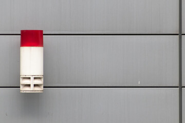 Red external burglar alarm system light as theft protection and burglar prevention and security and...