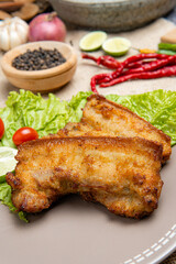 Delicious and crispy Samcan Goreng or Fried Pork Belly from medan - north sumatra