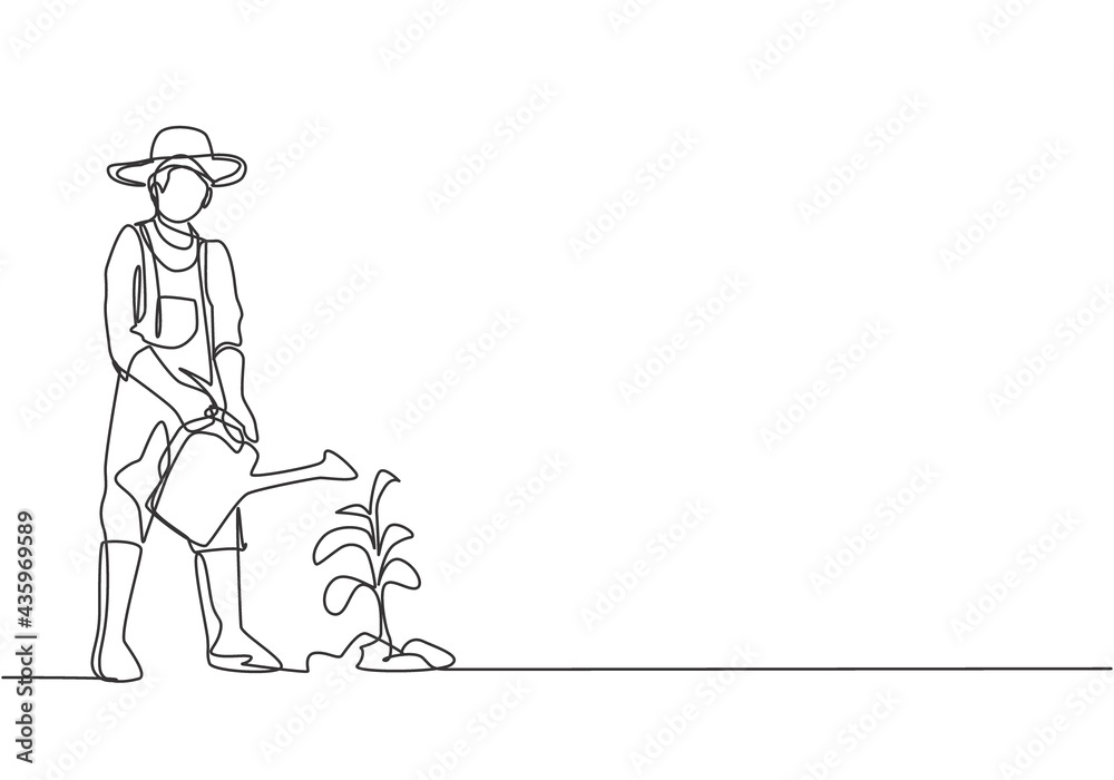 Wall mural single continuous line drawing young male farmer water the plants using a watering can. farmer plant