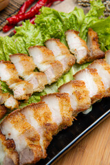Delicious and crispy Samcan Goreng or Fried Pork Belly from medan - north sumatra