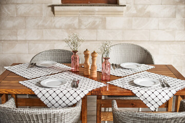 Served table at summer terrace cafe, time for breakfast or lunch