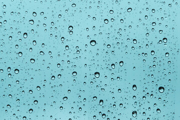 The concept of water drops on the windshield background.