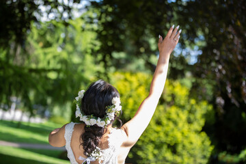 Bride Rising A Hand In Nature
