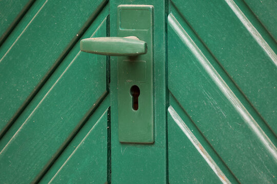 Keyhole for the key on the green gate