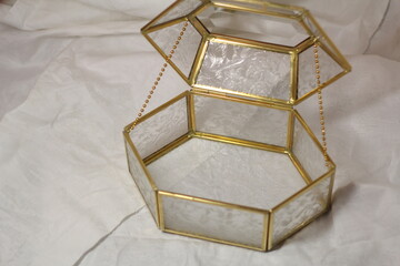 Saint-Petersburg, RUSSIA - 26.05.21: Wedding glass box, wedding decoration, bride and groom, wedding rings.