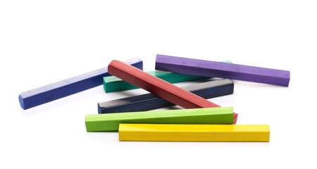 Fototapeta premium Colorful chalks pile isolated on white background