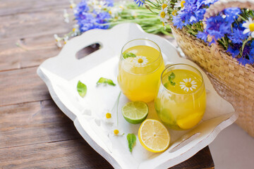 Glasses with lemonade and mint summer