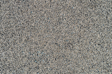 texture of the wall covered with stone crumbs