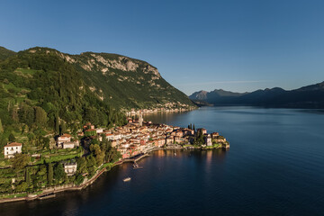 Varenna city on Lake Como with its walk on lakefront and mountains.