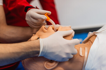 Obraz premium Close-up detail of a training dummy with a nasogastric (NG) tube. Healthcare and education concept.