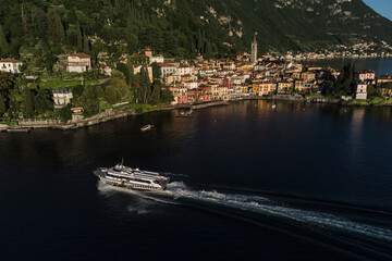 Varenna, Italy - may 25, 2021: Voloire hydrofoil on lake Como with Varenna city on the background,...
