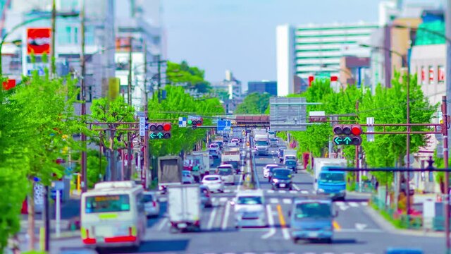 A timelapse of miniature traffic jam at the avenue tiltshift panning