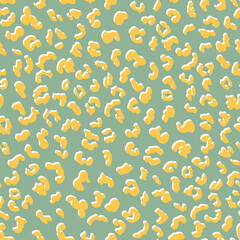 Abstract leo seamless repeat pattern. Random placed, white and yellow vector animal all over surface print on green background.