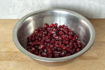 frozen cranberries in a metal bowl