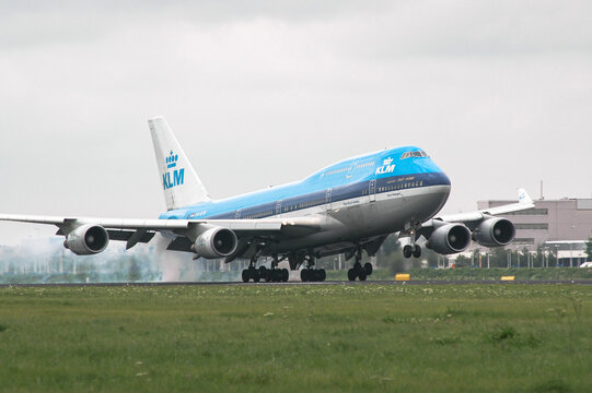 AMSTERDAM, NETHERLANDS - AUGUST 16, 2008: A Boeing B747-400 from KLM is touching down the runway