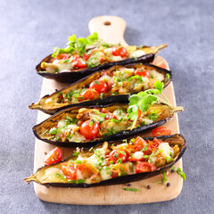 baked stuffed aubergine with vegetables and mozzarella