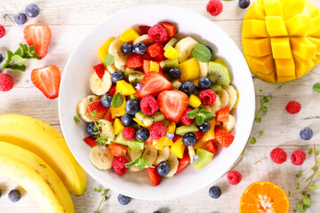 fruit salad with berry fruit, mango and banana