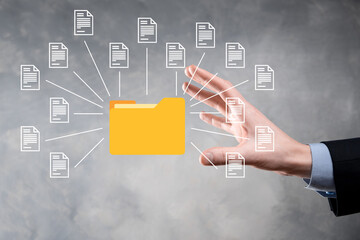 Document Management System DMS .Businessman hold folder and document icon.Software for archiving, searching and managing corporate files and information.Internet Technology Concept.Digital security.