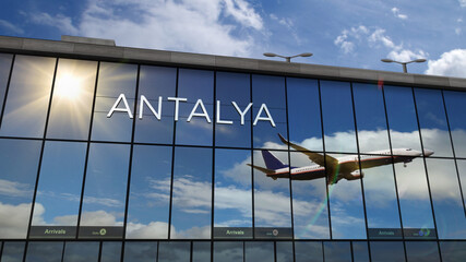 Fototapeta premium Airplane landing at Antalya Turkey airport mirrored in terminal