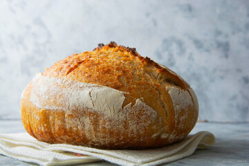 Sourdough homemade bread made from wild yeast, healthy lifestyle, home cooking concept.