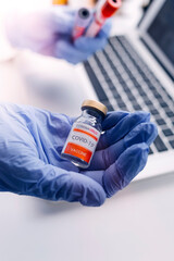 vaccines fight against virus covid-19 corona virus, doctor or scientist in laboratory holding a...