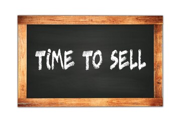 Fototapeta premium TIME TO SELL text written on wooden frame school blackboard.