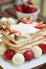 Homemade meringue Keto cake with strawberries. High quality photo