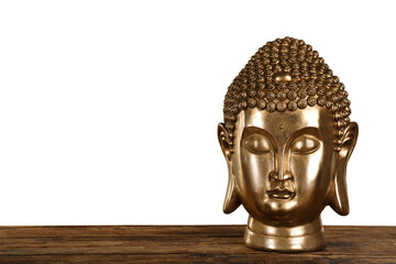 Beautiful golden Buddha sculpture on wooden table against grey background. Space for text