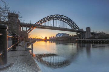The bridges between Gateshead and Newcastle-upon-Tyne on the River Tyne with a stunning late summer sunrise.