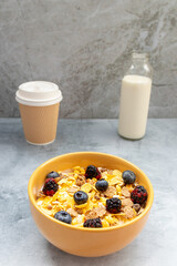 Breakfast with granola cereal and fruits