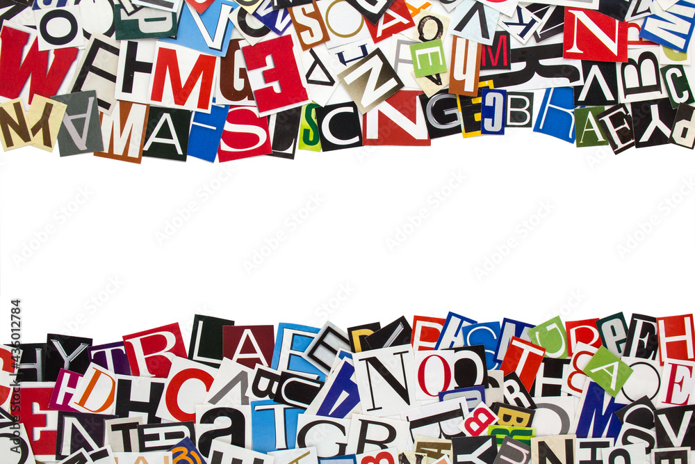 Wall mural Alphabet letters cutting from paper magazine on white background with copy space for text. Abstract collage from clippings with newspaper magazine letters.