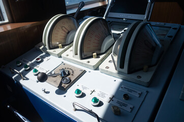 The captain's cabin of the ship. Throttle levers to control vehicle speed. Instrument panel with...