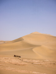 Fototapeta na wymiar Dunes in the desert near Dunhuang Oasis