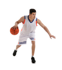 Professional sportsman playing basketball on white background