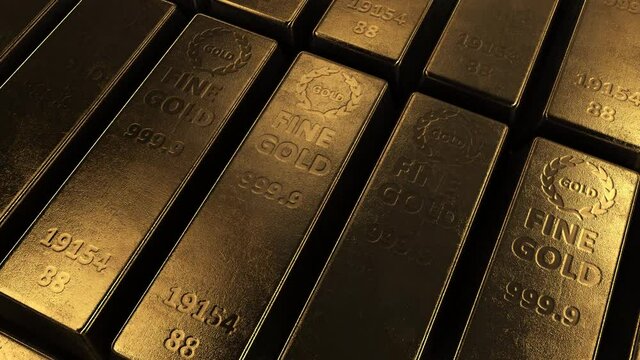 Moving over pure gold ingots 4k footage