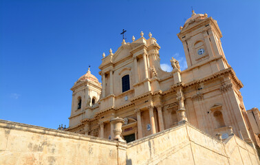 Fototapeta na wymiar the Cathedral of Noto is a jewel of Sicilian baroque that is located on the main street full of other masterpieces of Baroque architecture.