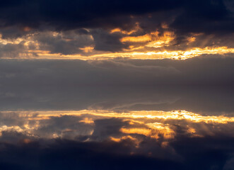 Fototapeta premium clouds and reflections at sunset