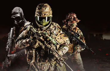 Photo of fully equipped soldiers in heavy level 3 armor ammunition, swat clothing and guillie suit squad standing on dark destructed city background.