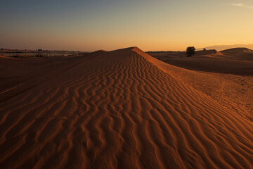 Desert sand pattern and sand doom during the sunset time