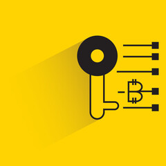 bitcoin private key icon with shadow on yellow background