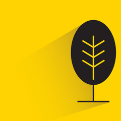 tree with shadow on yellow background