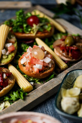 vegan appetizers on a wooden tray