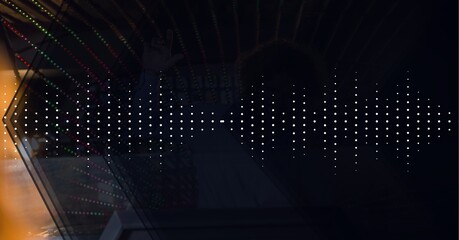 Composition of sound frequency dot level meters on orange and black background with chevrons