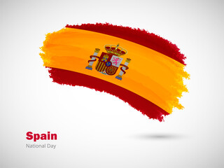 Happy national day of Spain with artistic watercolor country flag background. Grunge brush flag illustration
