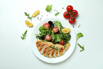 Concept of tasty eating with salad with grilled chicken on white background