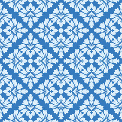 The pattern consists of floral ornament elements. In shades of blue.