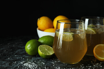 Beer with citrus and salt on dark background
