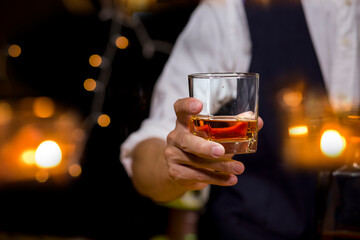 Bartender Serve Whiskey, on wood bar, 