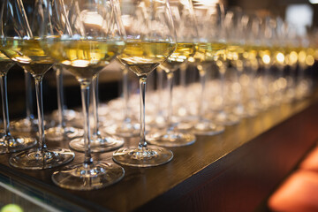 transparent glasses with champagne in a restaurant close-up