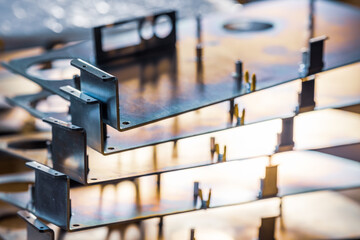 Metal boards and accessories lie on the surface